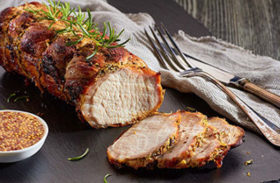 Varkensgebraad in mosterdsaus